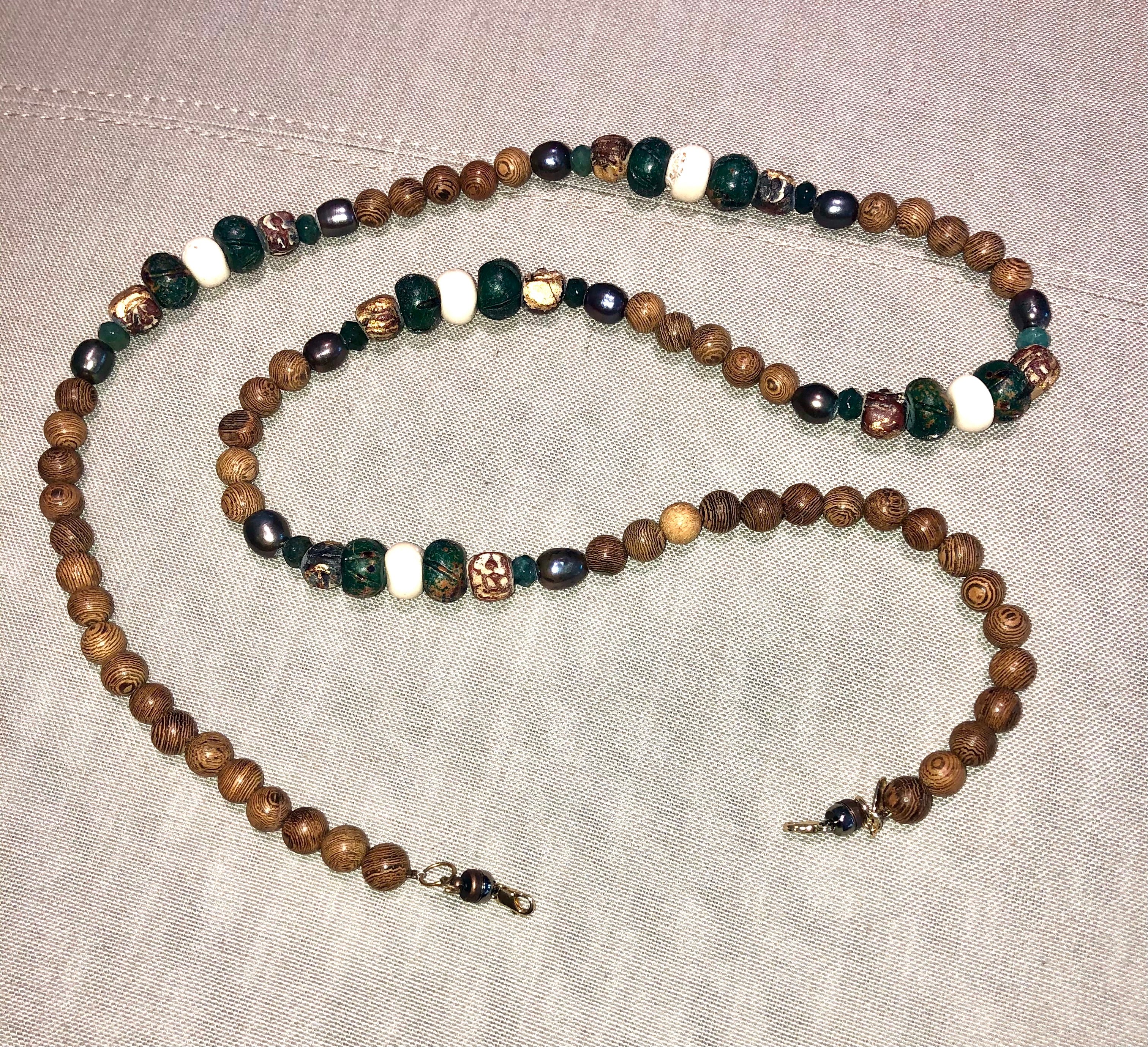 freshwater baroque pearl, wood, green bone and jasper mask chain and necklace