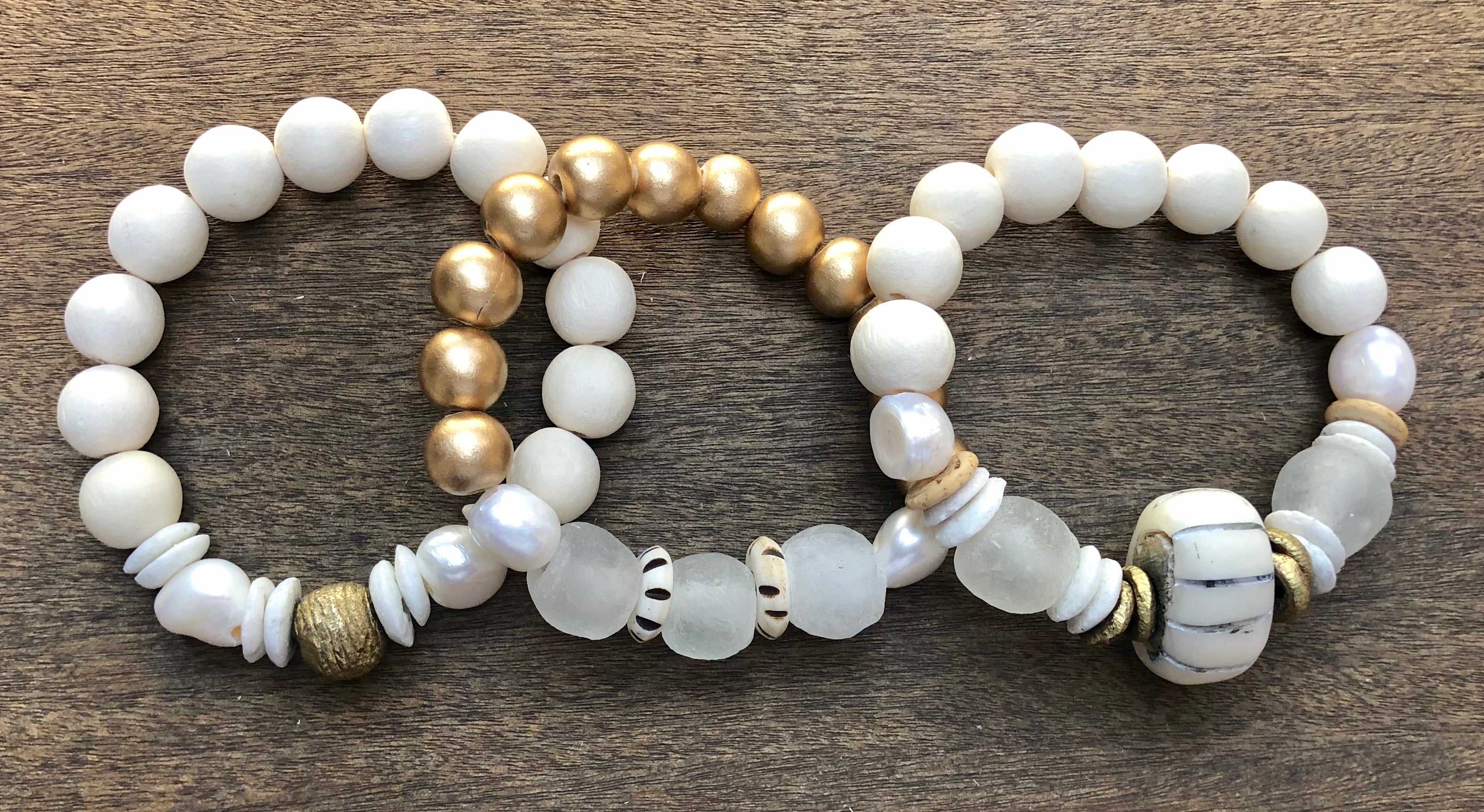 white african trade bead, white and gold wood, and freshwater baroque pearl bracelet