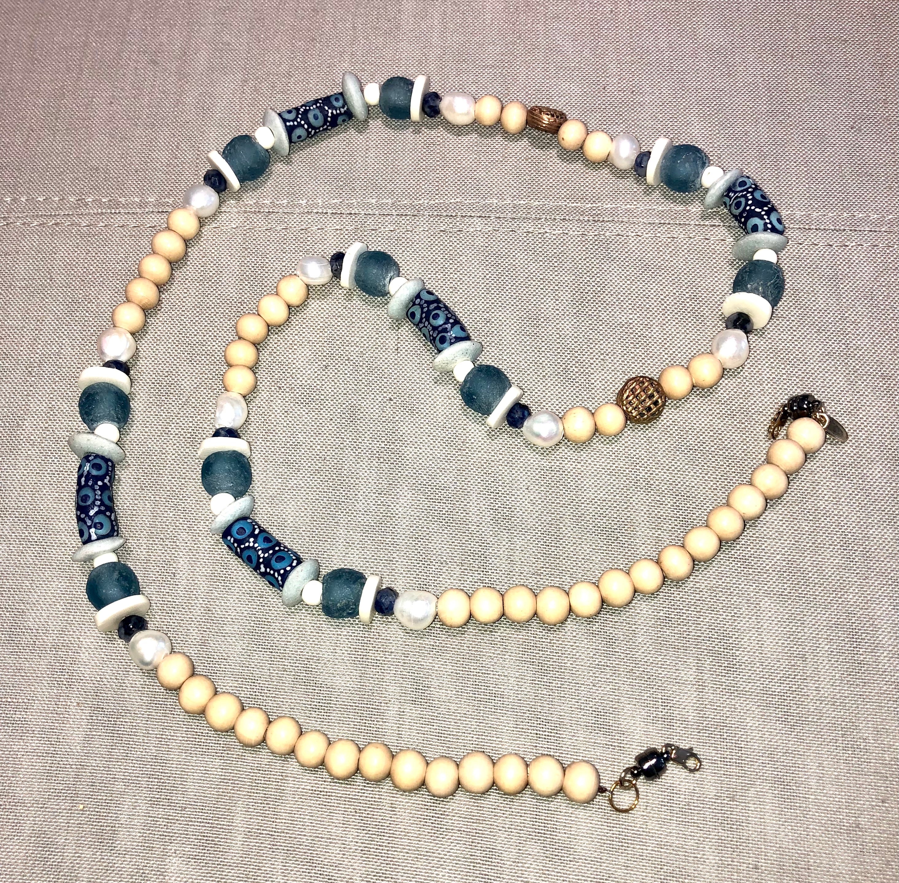 freshwater baroque pearl, wood, blue african bead and sodalite mask chain and necklace