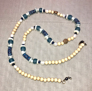 freshwater baroque pearl, wood, blue african bead and sodalite mask chain and necklace